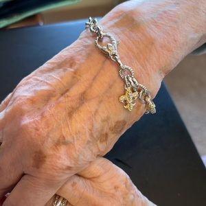 Fleur de lid stainless steel silver and gold tones clasp bracelet